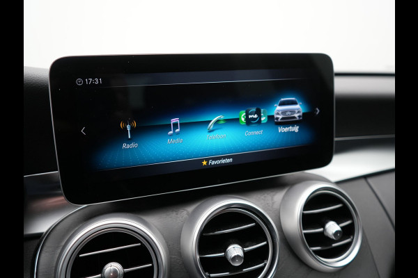 Mercedes-Benz C-Klasse Estate 300 e Business Solution AMG PHEV 320pk | Trekhaak af Fabriek | Adaptive Cruise | Alcantara Sportstoelen Verwarmd | Apple Carplay | Camera | BLIS | 18"L.M | Plug In Hybrid