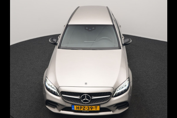 Mercedes-Benz C-Klasse Estate 300 e Business Solution AMG PHEV 320pk | Trekhaak af Fabriek | Adaptive Cruise | Alcantara Sportstoelen Verwarmd | Apple Carplay | Camera | BLIS | 18"L.M | Plug In Hybrid