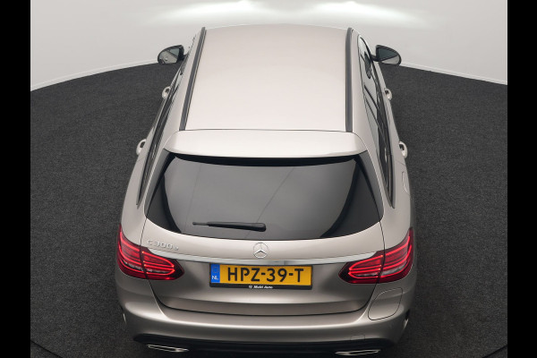 Mercedes-Benz C-Klasse Estate 300 e Business Solution AMG PHEV 320pk | Trekhaak af Fabriek | Adaptive Cruise | Alcantara Sportstoelen Verwarmd | Apple Carplay | Camera | BLIS | 18"L.M | Plug In Hybrid