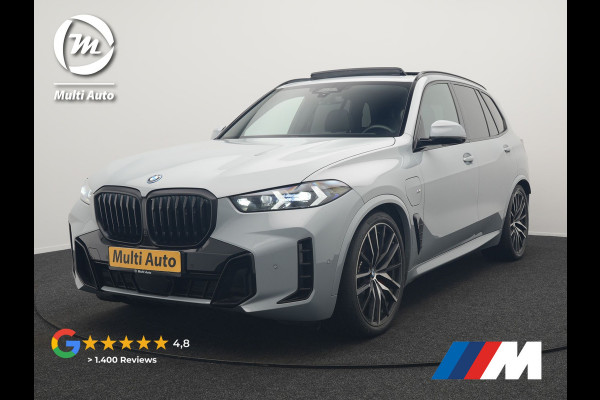 BMW X5 xDrive50e M Sport PRO Plug In Hybrid 490pk Dealer O.H. PHEV | Trekhaak Af Fabriek | Luchtvering | Panodak Skylounge | Adaptive Cruise | 360 Camera | Harman / Kardon | Merino Lederen Sportstoelen Memory & Verwarmd | Bekerhouders Verwarmd & Gekoeld | Stuur Verwarmd | Sfeerverlichting | Keyless | Blis | Navigatie | DAB |
