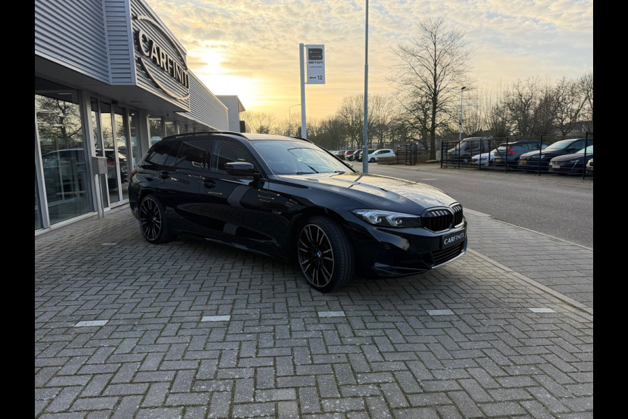 BMW 3 Serie Touring 320e FACELIFT / Navi / Cruise / Camera / Climate / Trekhaak / 20" Breedset.
