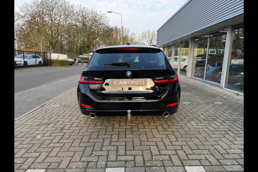 BMW 3 Serie Touring 320e FACELIFT / Navi / Cruise / Camera / Climate / Trekhaak / 20" Breedset.