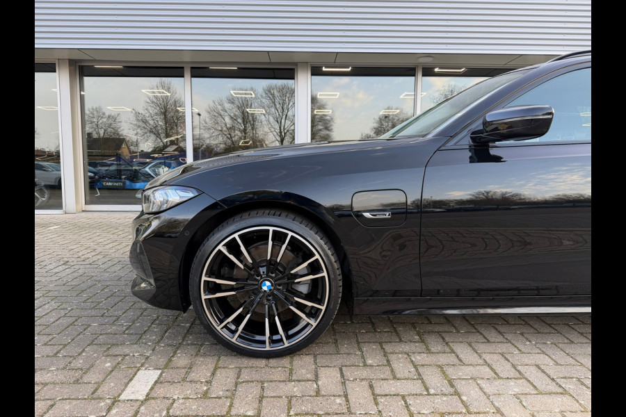 BMW 3 Serie Touring 320e FACELIFT / Navi / Cruise / Camera / Climate / Trekhaak / 20" Breedset.