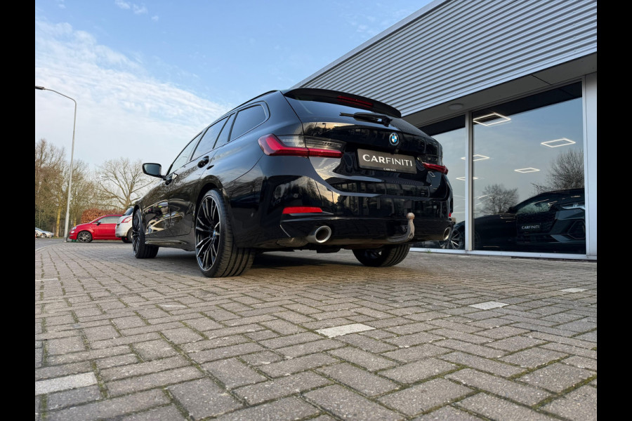 BMW 3 Serie Touring 320e FACELIFT / Navi / Cruise / Camera / Climate / Trekhaak / 20" Breedset.
