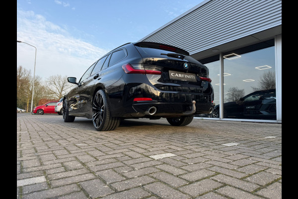 BMW 3 Serie Touring 320e FACELIFT / Navi / Cruise / Camera / Climate / Trekhaak / 20" Breedset.