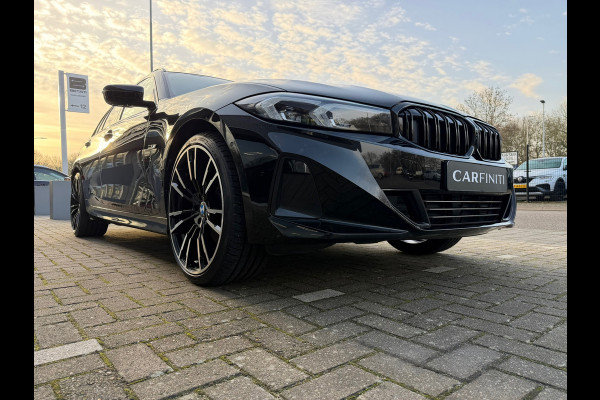 BMW 3 Serie Touring 320e FACELIFT / Navi / Cruise / Camera / Climate / Trekhaak / 20" Breedset.