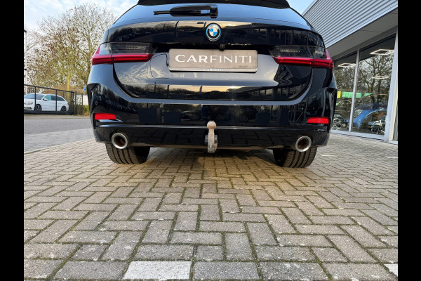 BMW 3 Serie Touring 320e FACELIFT / Navi / Cruise / Camera / Climate / Trekhaak / 20" Breedset.
