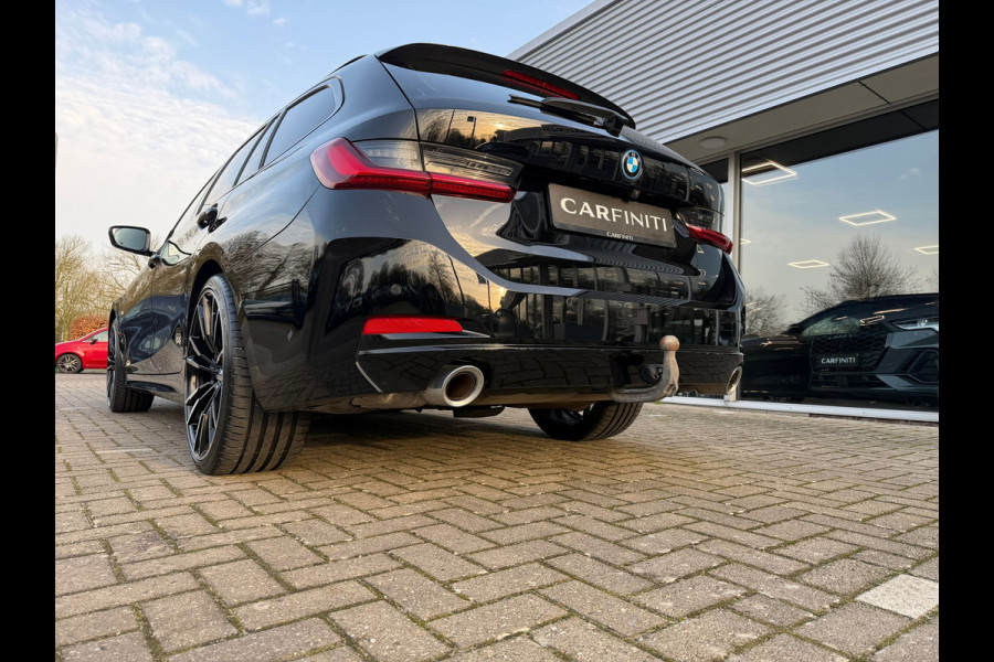 BMW 3 Serie Touring 320e FACELIFT / Navi / Cruise / Camera / Climate / Trekhaak / 20" Breedset.