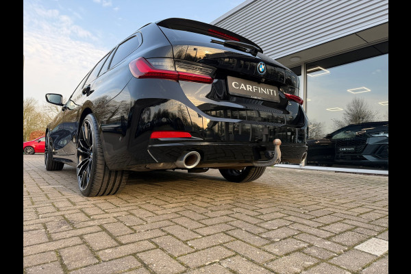 BMW 3 Serie Touring 320e FACELIFT / Navi / Cruise / Camera / Climate / Trekhaak / 20" Breedset.