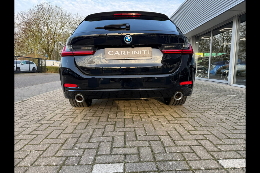 BMW 3 Serie Touring 320e FACELIFT / Navi / Cruise / Camera / Climate / Trekhaak / 20" Breedset.