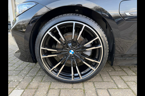 BMW 3 Serie Touring 320e FACELIFT / Navi / Cruise / Camera / Climate / Trekhaak / 20" Breedset.