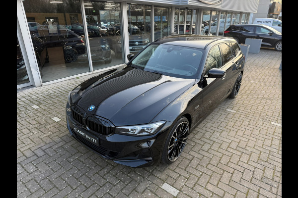 BMW 3 Serie Touring 320e FACELIFT / Navi / Cruise / Camera / Climate / Trekhaak / 20" Breedset.