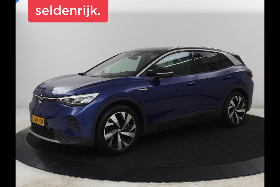 Volkswagen ID.4 First 77 kWh | SOH 90% | Stoel & stuurverwarming | Adaptive cruise | Camera | Carplay | Half leder | Navigatie | 20'' | Full LED | Keyless | Climate control | Sfeerverlichting
