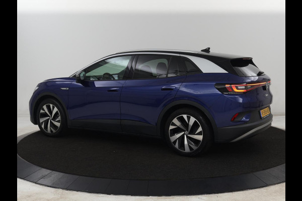 Volkswagen ID.4 First 77 kWh | SOH 90% | Stoel & stuurverwarming | Adaptive cruise | Camera | Carplay | Half leder | Navigatie | 20'' | Full LED | Keyless | Climate control | Sfeerverlichting
