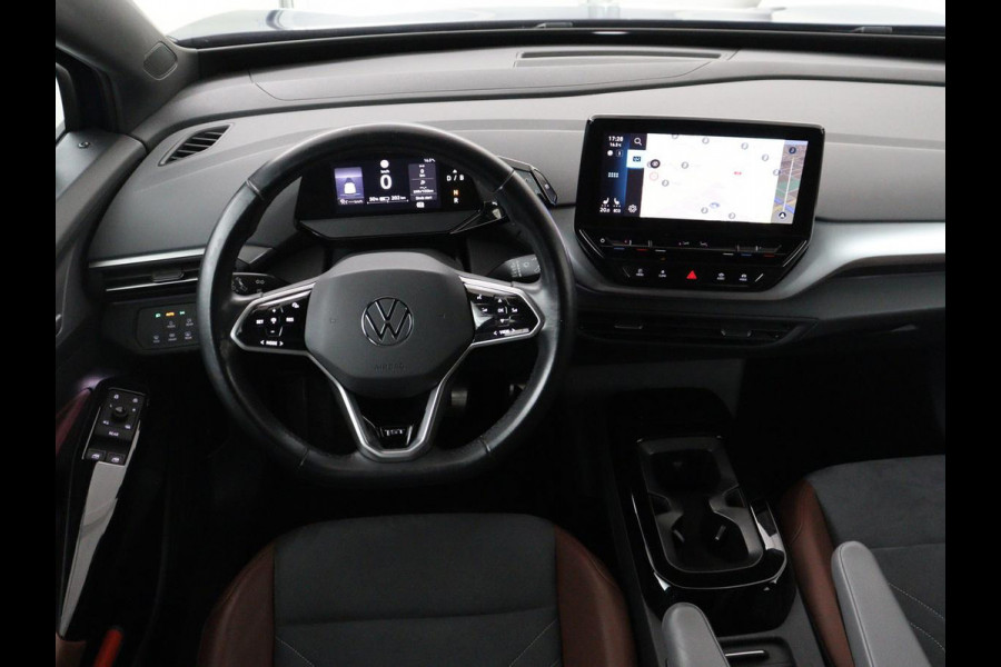 Volkswagen ID.4 First 77 kWh | SOH 90% | Stoel & stuurverwarming | Adaptive cruise | Camera | Carplay | Half leder | Navigatie | 20'' | Full LED | Keyless | Climate control | Sfeerverlichting