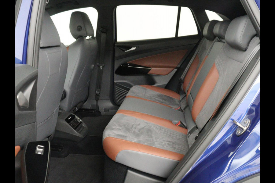Volkswagen ID.4 First 77 kWh | SOH 90% | Stoel & stuurverwarming | Adaptive cruise | Camera | Carplay | Half leder | Navigatie | 20'' | Full LED | Keyless | Climate control | Sfeerverlichting