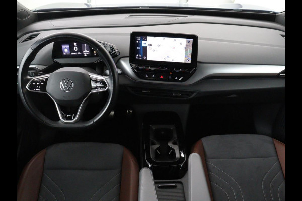 Volkswagen ID.4 First 77 kWh | SOH 90% | Stoel & stuurverwarming | Adaptive cruise | Camera | Carplay | Half leder | Navigatie | 20'' | Full LED | Keyless | Climate control | Sfeerverlichting