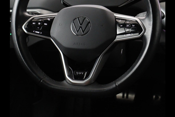 Volkswagen ID.4 First 77 kWh | SOH 90% | Stoel & stuurverwarming | Adaptive cruise | Camera | Carplay | Half leder | Navigatie | 20'' | Full LED | Keyless | Climate control | Sfeerverlichting