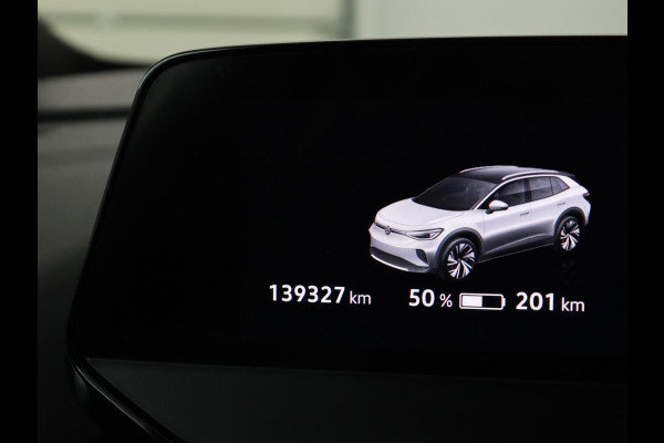 Volkswagen ID.4 First 77 kWh | SOH 90% | Stoel & stuurverwarming | Adaptive cruise | Camera | Carplay | Half leder | Navigatie | 20'' | Full LED | Keyless | Climate control | Sfeerverlichting