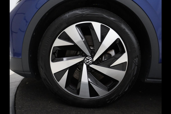 Volkswagen ID.4 First 77 kWh | SOH 90% | Stoel & stuurverwarming | Adaptive cruise | Camera | Carplay | Half leder | Navigatie | 20'' | Full LED | Keyless | Climate control | Sfeerverlichting