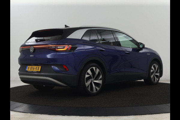 Volkswagen ID.4 First 77 kWh | SOH 90% | Stoel & stuurverwarming | Adaptive cruise | Camera | Carplay | Half leder | Navigatie | 20'' | Full LED | Keyless | Climate control | Sfeerverlichting