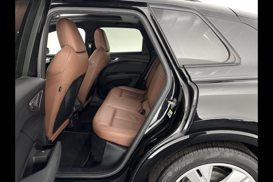 Audi Q4 e-tron 40 Launch edition S Competition 77 kWh [ 3-Fase-11kW ] {SOH-90%} (INCL-BTW) Aut. *HEATPUMP | PANO | LEATHER | MATRIX-LED | AUDI-SOUND | ADAPTIVE-CRUISE | HEATED-SPORTSEATS | AMBIENT-LIGHT | DIGI-COCKPIT | CAMERA | KEYLESS | DAB+ | 20''ALU*