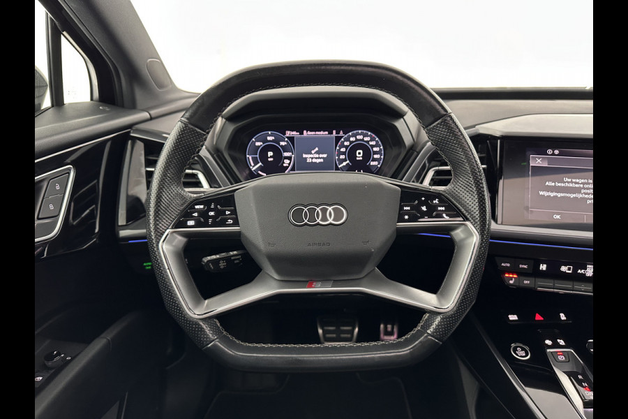 Audi Q4 e-tron 40 Launch edition S Competition 77 kWh [ 3-Fase-11kW ] {SOH-90%} (INCL-BTW) Aut. *HEATPUMP | PANO | LEATHER | MATRIX-LED | AUDI-SOUND | ADAPTIVE-CRUISE | HEATED-SPORTSEATS | AMBIENT-LIGHT | DIGI-COCKPIT | CAMERA | KEYLESS | DAB+ | 20''ALU*