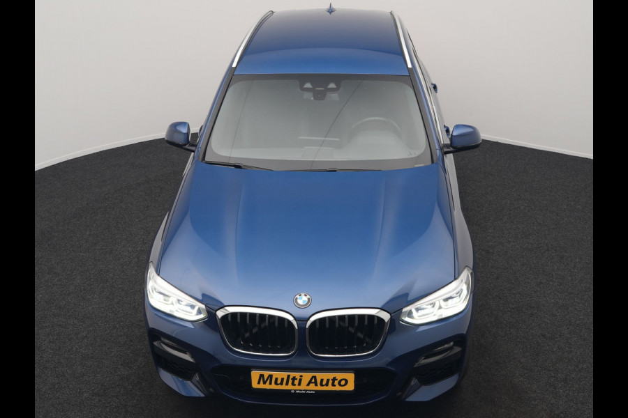 BMW X3 xDrive30e M Sport Plug In Hybrid 293pk Dealer O.H. PHEV | Trekhaak Af Fabriek | Camera | Adaptief Onderstel | Lederen Sportstoelen Verwarmd | Adaptive LED | Hifi Audio | Sfeerverlichting | 20"L.M | Virtual | Navigatie | DAB | Cruise Control |