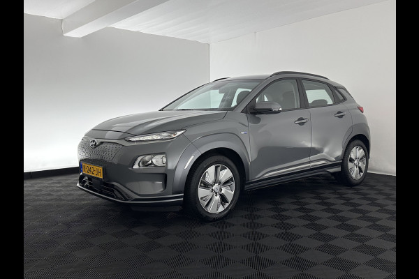 Hyundai Kona EV Comfort 39 kWh [ 3-Fase-11kW] (INCL-BTW) *DIGI-COCKPIT | ADAPTIVE-CRUISE | CARPLAY | DAB | LANE-ASSIST | KEYLESS | COMFORT-SEATS | CCS-FASTLOADER | SHIFTPADDLES | 17"ALU*