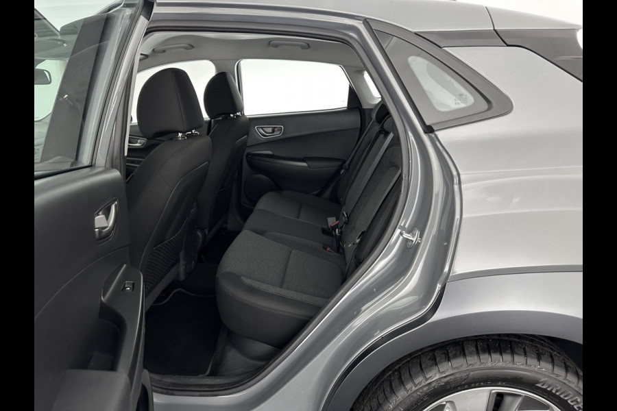 Hyundai Kona EV Comfort 39 kWh [ 3-Fase-11kW] (INCL-BTW) *DIGI-COCKPIT | ADAPTIVE-CRUISE | CARPLAY | DAB | LANE-ASSIST | KEYLESS | COMFORT-SEATS | CCS-FASTLOADER | SHIFTPADDLES | 17"ALU*