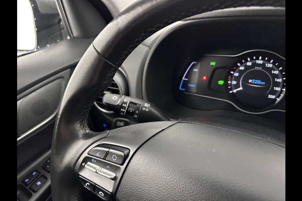 Hyundai Kona EV Comfort 39 kWh [ 3-Fase-11kW] (INCL-BTW) *DIGI-COCKPIT | ADAPTIVE-CRUISE | CARPLAY | DAB | LANE-ASSIST | KEYLESS | COMFORT-SEATS | CCS-FASTLOADER | SHIFTPADDLES | 17"ALU*