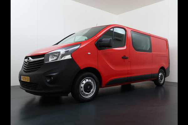 Opel Vivaro D126PK Dubbele Cabine 5-Persoons L2H1 Euro 6 Trekhaak Camera Navi Airco Cruise Control Pdc 1.6CDTI Betonplex Vloer Schuifdeur Achterdeuren Regen-Lichtsensor 1e Eigenaar Origineel Nederlandse Auto Dealeronderhouden 2.000kg trekvermogen