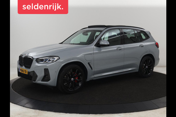 BMW X3 xDrive30e M Sport | Panoramadak | Head-Up | Stoelverwarming | Trekhaak | 360 Camera | Leder | Sportstoelen | Carplay | Sfeerverlichting | Laserlicht | Live Cockpit | Navigatie | PHEV | Plug In