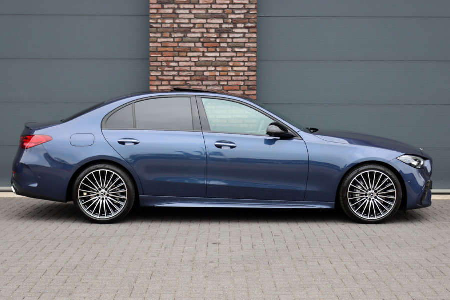 Mercedes-Benz C-Klasse 220 d AMG Line | Panoramadak | Surround Camera | Memory | Digital Light | Advanced Sound System | HUD | Keyless Go | Verwarmd Stuurwiel | Augmented Reality |