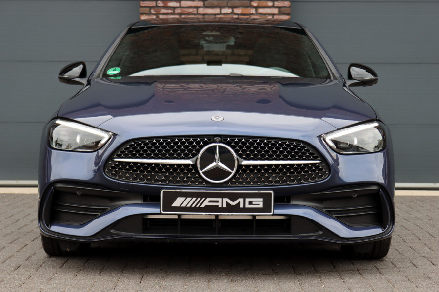 Mercedes-Benz C-Klasse 220 d AMG Line | Panoramadak | Surround Camera | Memory | Digital Light | Advanced Sound System | HUD | Keyless Go | Verwarmd Stuurwiel | Augmented Reality |