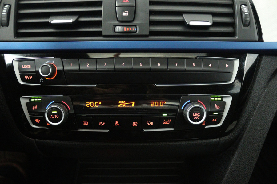 BMW 3 Serie Touring 330i High Executive (PANORAMADAK, STOELVERWARMING, LEER, NAVIGATIE, PARKEERSENSOREN)