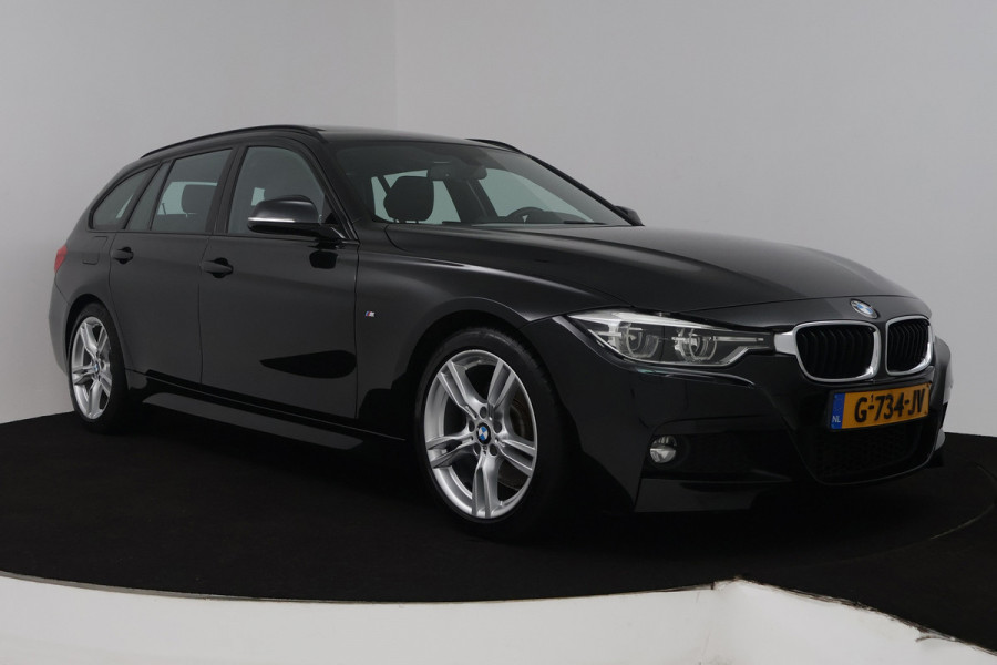BMW 3 Serie Touring 330i High Executive (PANORAMADAK, STOELVERWARMING, LEER, NAVIGATIE, PARKEERSENSOREN)