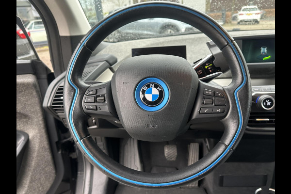 BMW i3 Basis 120Ah 42 kWh SOH 100% | 3-FASE LADER | WARMTEPOMP | ORIGINEEL NL AUTO MET NAP | DEALER ONDERHOUDEN | STOELVERWARMING | CAMERA | 12 MND BOVAG GARANTIE
