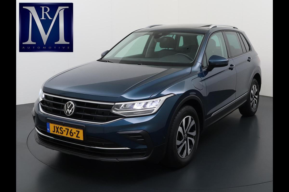 Volkswagen Tiguan 1.4 TSI eHybrid PHEV VAN €32.900,- NU VOOR SLECHTS €29.877,- Uw LENTEVOORDEEL €3.023,- |ADAPTIVE CRUISE CONTROL| PANO| STOEL + STUURVERWARMING| 360 CAMERA| PARKEER ASSISTENT| RIJKLAARPRIJS INCL. 12 MND BOVAG GARANTIE