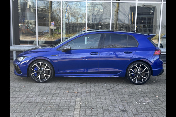 Volkswagen Golf 2.0 TSI R 4Motion / Adaptief Onderstel / Harman Kardon / 100% Historie / Panoramadak / LED / 19 Inch / Head-Up Display / Sportstoelen / Stoelverwarming / Stuurwiel Verwarmd / Dodehoek Detectie