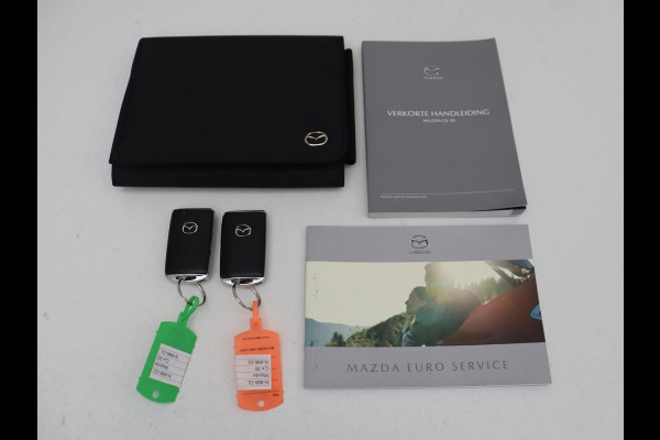 Mazda CX-30 2.0 e-SkyActiv-X M Hybrid Comfort | Stoelverwarming | Head-Up | Camera | Carplay | Adaptive cruise | Navigatie | Stuurverwarming | 18'' | Keyless | Full LED | Climate control