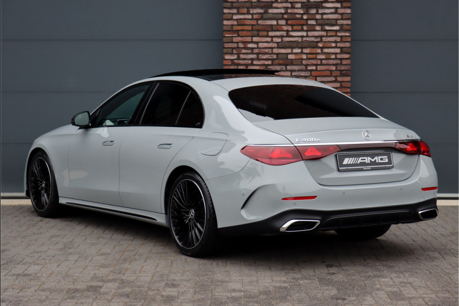 Mercedes-Benz E-Klasse 400 e 4MATIC AMG Line | Hyperscreen | Luchtvering | Achterasbesturing | Distronic+ | HUD | Massage | Burmester | Nappa Leder | Trekhaak | Vlakkenverwarming | Stoelventilatie |