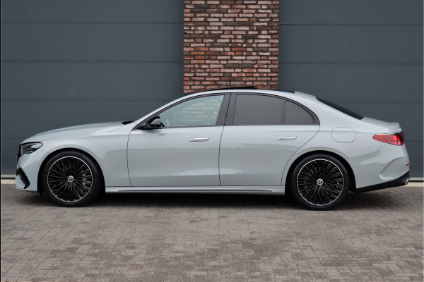 Mercedes-Benz E-Klasse 400 e 4MATIC AMG Line | Hyperscreen | Luchtvering | Achterasbesturing | Distronic+ | HUD | Massage | Burmester | Nappa Leder | Trekhaak | Vlakkenverwarming | Stoelventilatie |