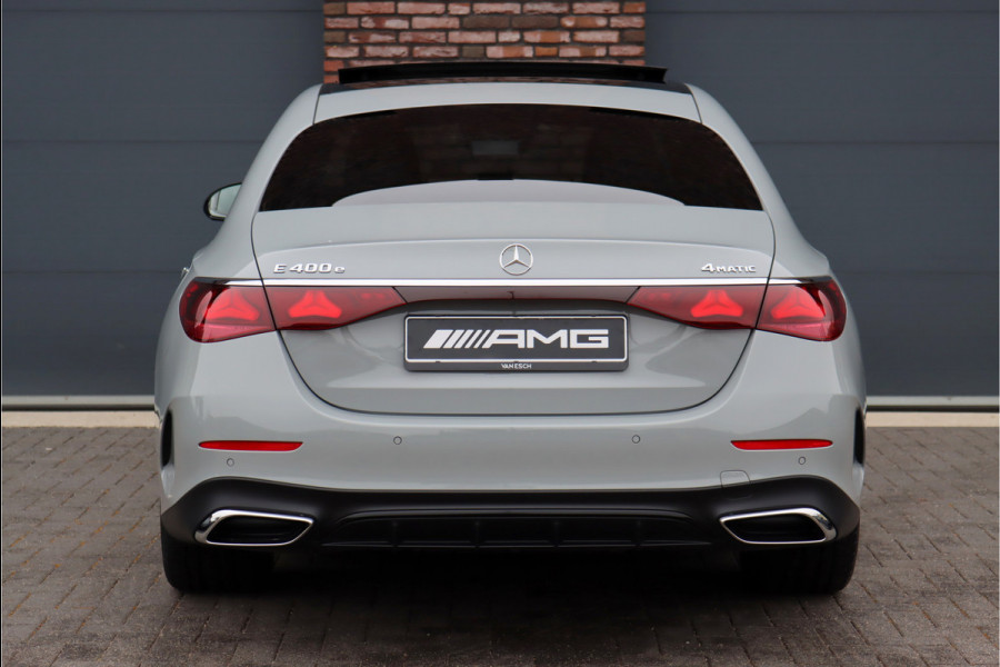 Mercedes-Benz E-Klasse 400 e 4MATIC AMG Line | Hyperscreen | Luchtvering | Achterasbesturing | Distronic+ | HUD | Massage | Burmester | Nappa Leder | Trekhaak | Vlakkenverwarming | Stoelventilatie |