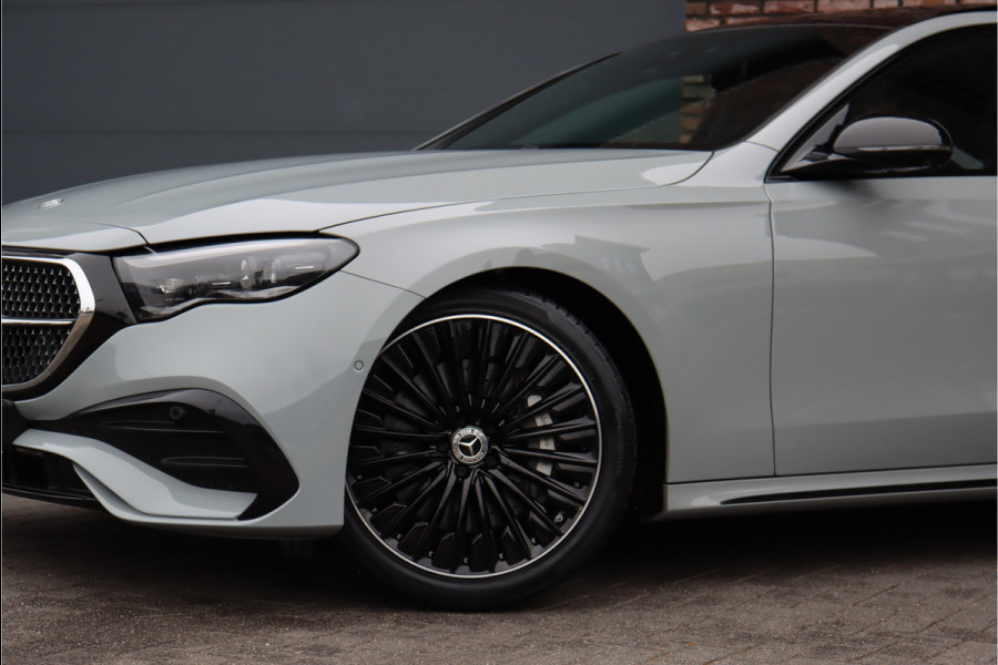 Mercedes-Benz E-Klasse 400 e 4MATIC AMG Line | Hyperscreen | Luchtvering | Achterasbesturing | Distronic+ | HUD | Massage | Burmester | Nappa Leder | Trekhaak | Vlakkenverwarming | Stoelventilatie |