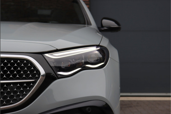 Mercedes-Benz E-Klasse 400 e 4MATIC AMG Line | Hyperscreen | Luchtvering | Achterasbesturing | Distronic+ | HUD | Massage | Burmester | Nappa Leder | Trekhaak | Vlakkenverwarming | Stoelventilatie |