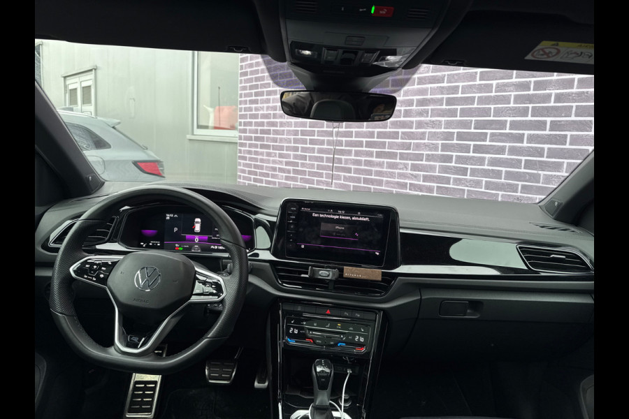 Volkswagen T-Roc 2.0 TSI 4Motion R-Line Business+ / 26.553 km! / Panoramadak / Camera / Leder / Matrix LED / 18'' / Sfeerverlichting / CarPlay / Stoelverwarming / DAB / ACC