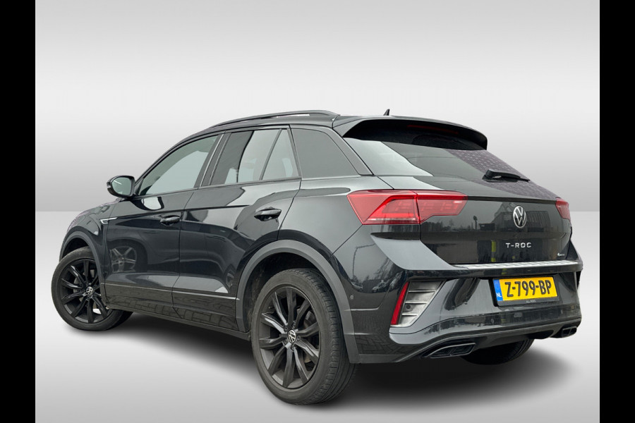 Volkswagen T-Roc 2.0 TSI 4Motion R-Line Business+ / 26.553 km! / Panoramadak / Camera / Leder / Matrix LED / 18'' / Sfeerverlichting / CarPlay / Stoelverwarming / DAB / ACC