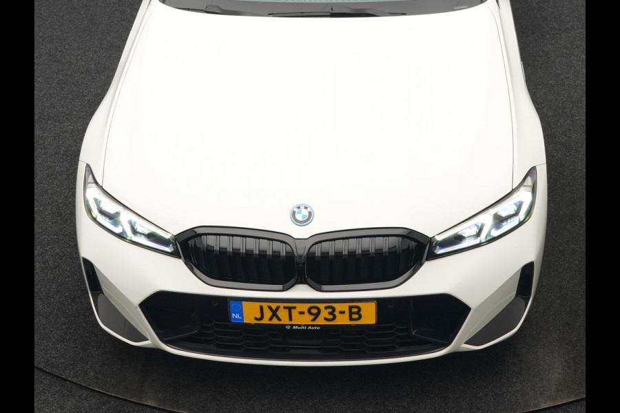 BMW 3 Serie Touring 320e M Sport FACELIFT Plug In Hybrid 204pk Dealer O.H PHEV | Trekhaak Af Fabriek | Adapive Cruise | Widescreen Navi | Head Up | Alcantara Sportstoelen Verwarmd | Camera & Parkassist | Apple Carplay |