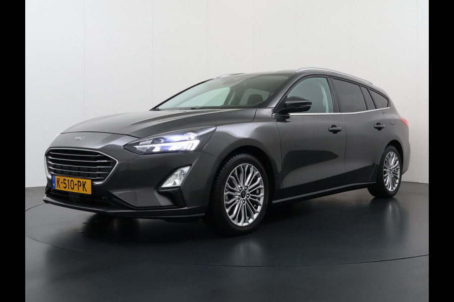 Ford FOCUS Wagon 1.0T 126PK Trekhaak Navi Dual-Ecc Apple Carplay Android Auto Stoel+Voorruitverwarming Cruise Control Pdc Titanium Business Lmv Led Privacy Glas Lane Assist TCS Keyless Licht-/Regensensor 1e Eigenaar Origineel Nederlandse Auto Dealeronderhouden